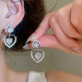 18K Gold Plated Copper Zircon Heart Stud Earrings With Silver Posts Light Luxury Oval Design view 3
