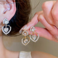 18K Gold Plated Copper Zircon Heart Stud Earrings With Silver Posts Light Luxury Oval Design view 1
