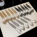Gothic Cyberpunk Iron Chain Finger Bracelet With Hollow Cone Tassel Hand Harness Ring Design view 2