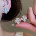 Light Luxury Copper Zircon Flower Clip-on Earrings, Korean No-Piercing Ear Cuff Jewelry view 1