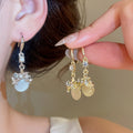 Sparkling Rhinestone Cat Eye Resin Round Geometric Hook Earrings Light Luxury Elegant Fashion view 2