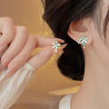 Delicate Floral Petal Cat Eye Stone Oval Stud Earrings With Sparkling Rhinestones Light Luxury Style view 2