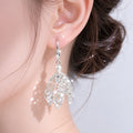 Elegant Silver Alloy Pearl Lace Petal Skirt Fringe Long Drop Stud Women's Fashion Statement Earrings view 1