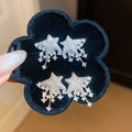 Light Luxury Copper Star Stud Earrings With Silver Pins And Sparkling Zircon Meteor Design view 1