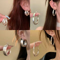 2026 New C-Shaped Polka Dot Iron Hoop Earrings Geometric Versatile Light Luxury Ear Jewelry view 2