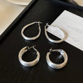 2026 New Minimalist Iron Polka Dot C Shape Hoop Earrings Fashion Geometric Light Luxury Jewelry view 4