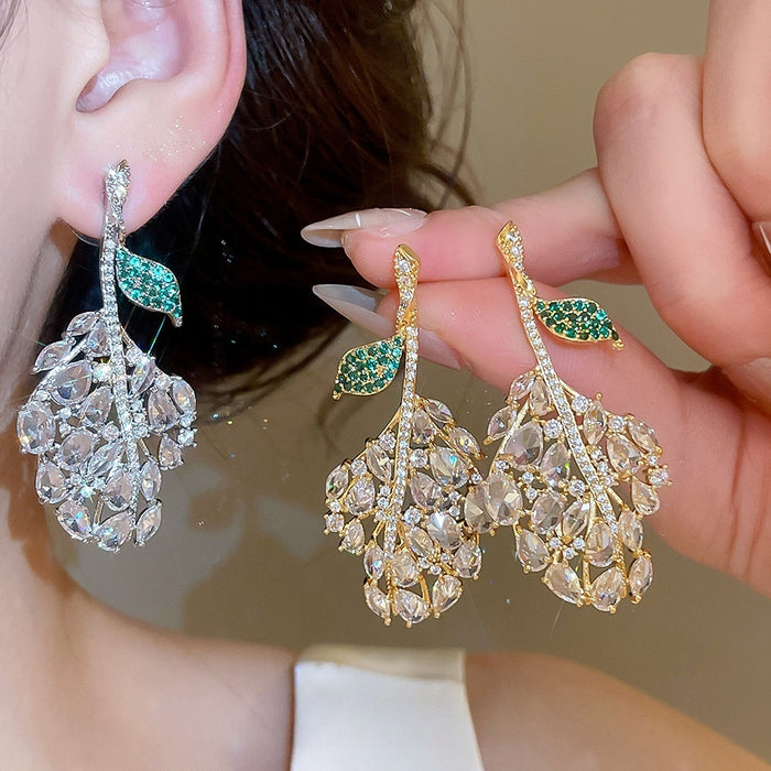 Light Luxury Copper Zircon Hollow Leaf Stud Earrings For Elegant Evening Wear