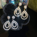 Light Luxury Copper Teardrop Zircon Stud Earrings, Sparkling Elegant Designer Jewelry view 1