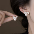 French Style Zircon Bow Faux Pearl Stud Earrings For Women Hollow Light Luxury Jewelry view 2