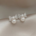French Style Zircon Bow Faux Pearl Stud Earrings For Women Hollow Light Luxury Jewelry view 1