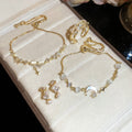 2026 Korean Style Faux Pearl Zircon Bow Star Bangle Light Luxury Minimalist Bracelet view 1
