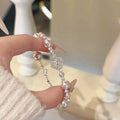 French Style Rhinestone Camellia Faux Pearl Bangle Elegant Light Luxury Floral Bracelet For Women view 3