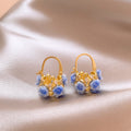 Rhinestone Resin Flower Basket Earrings Forest Style Elegant Floral Ear Clips view 3