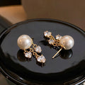 Elegant Pearl Studs With Gold Alloy Chains And Heart Zircon Crystal Dangles Luxury Women's Earrings view 2
