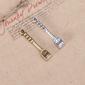 LOVE Lettered Shovel Alloy Charm in 3 Metal Finishes view 1