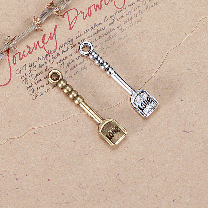 LOVE Lettered Shovel Alloy Charm in 3 Metal Finishes