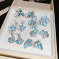 Korean Vacation Style Copper Shell Pearl Zircon Stud Earrings With Enamel Drip Design view 1