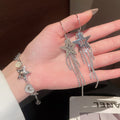 Light Luxury Copper Rhinestone Star Long Tassel Bracelet Earrings Jewelry Set view 2