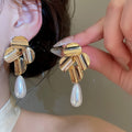 French Vintage Teardrop Faux Pearl Stud Earrings Elegant Light Luxury Jewelry For Women view 1