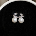 Light Luxury Round Faux Pearl Zircon Stud Earrings With Silver Needles For Elegant Women view 2