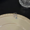 Light Luxury Copper Zircon Iris Flower Clip-on Earrings Geometric No-Piercing Ear Cuffs view 4