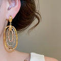 Vintage Hollow Oval Copper Metal Drop Earrings European Minimalist Geometric Stud Style view 3