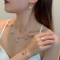 Four Piece Enamel Flower Heart Pearl Bracelet Ring Earrings Collarbone Necklace Set view 2