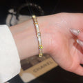 Light Luxury Copper Round Bangle With Sparkling Zircon Starburst Design, Elegant Fashion Hand Jewelry view 4