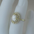Gold Tone Oval Cluster Halo Ring In A Polished Decorative Design view 4