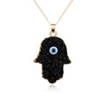 Gold Tone Crystal Cluster Hamsa Evil Eye Pendant Necklaces in Two Colors view 1
