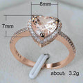 Rose Gold Tone Heart Stone Halo Ring In A Polished Decorative Design view 5