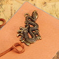 Coiled Chinese Dragon Metal Charms in Three Finishes view 4