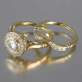 Round Halo Solitaire And Curved Band Two-Ring Set In Gold Tone view 1