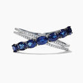 Silver Tone Blue Stone Crossover Band Ring Polished Metal Jewelry view 1