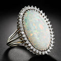 Opalescent Oval Cabochon Halo Ring In Polished Silver Tone view 1
