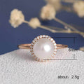 Rose Gold Pearl Halo Ring Round Center Clear CZ Border view 5