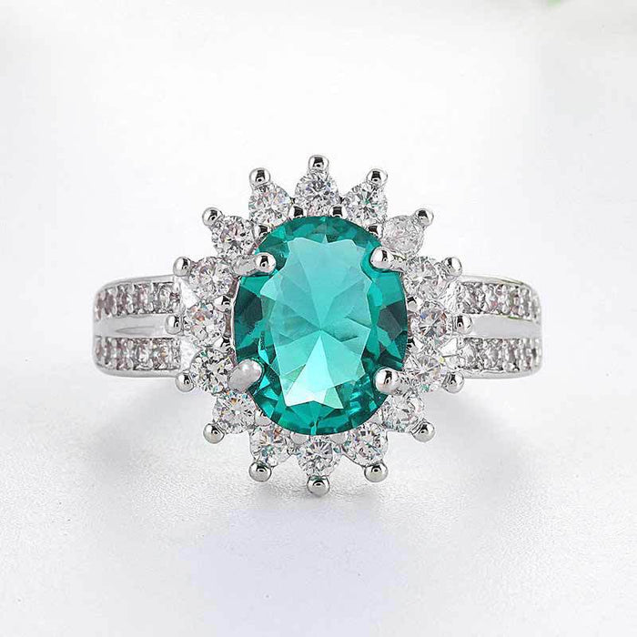 Silver Teal Oval Flower Halo Cubic Zirconia Cocktail Ring