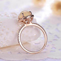 Rose Gold Tone Oval Opalescent Halo Ring In A Polished Decorative Design view 4