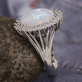 Opalescent Oval Cabochon Halo Ring In Polished Silver Tone view 3