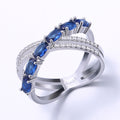 Silver Tone Blue Stone Crossover Band Ring Polished Metal Jewelry view 2