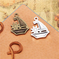 Sailboat and Wheel Metal Charm in 3 Finishes for Jewelry Crafts view 2