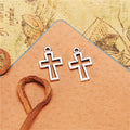 Small Outlined Cross Metal Charm in Three Finishes view 4