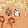 Irregular Clock Face Metal Charm in Three Finishes view 1