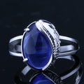 Silver-Tone Blue Cabochon Ring With Sculpted Wing Setting view 2