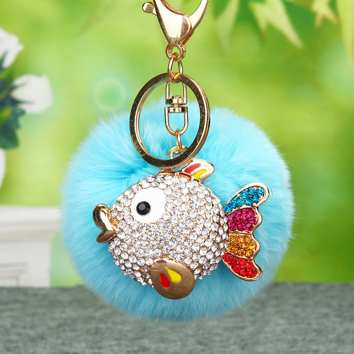 Jeweled Fish Plush Pom Pom Keychains in Fifteen Pictured Colors
