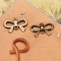 Alloy Bow Connector Charm with Top and Bottom Holes 22x14mm