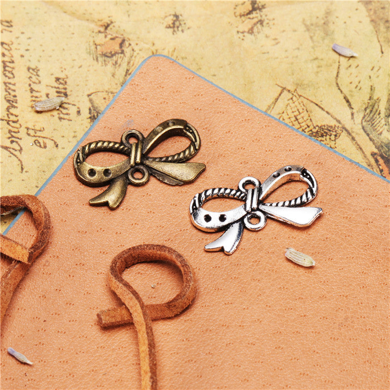 Alloy Bow Connector Charm with Top and Bottom Holes 23x13mm
