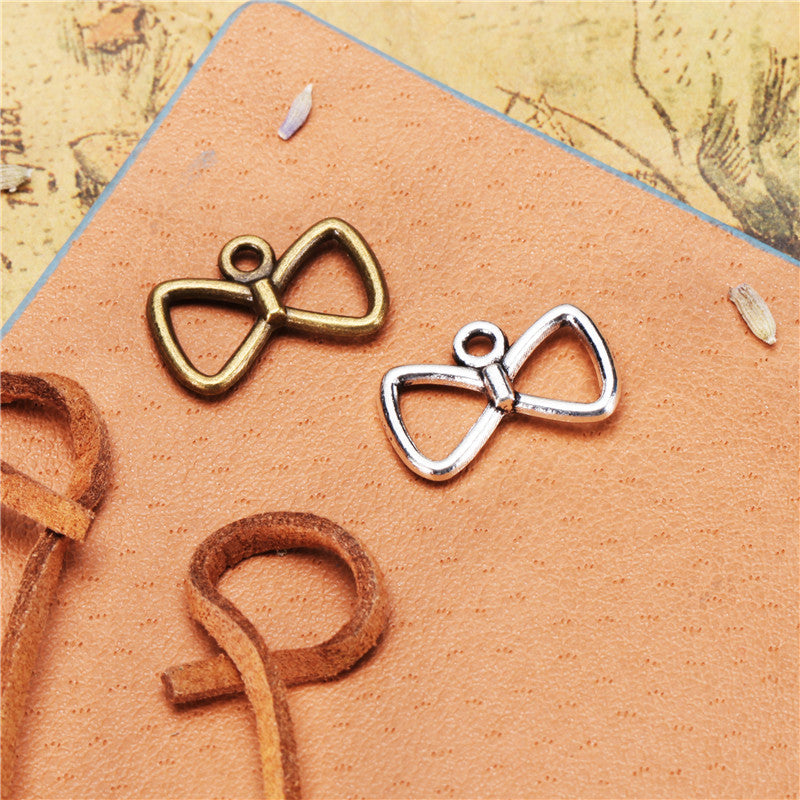 Double-Sided Openwork Bow Alloy Charm Pendant 18x12mm