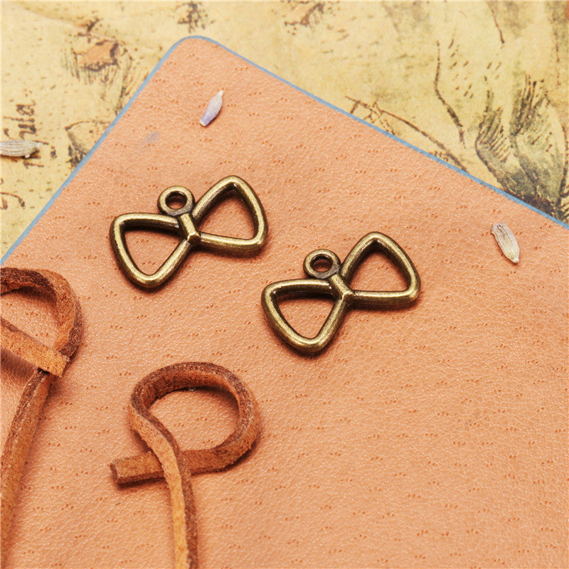 Double-Sided Openwork Bow Alloy Charm Pendant 18x12mm