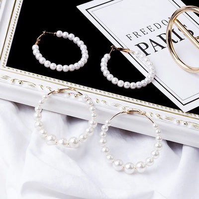 Primary supplied view of pearl-look large hoop earrings